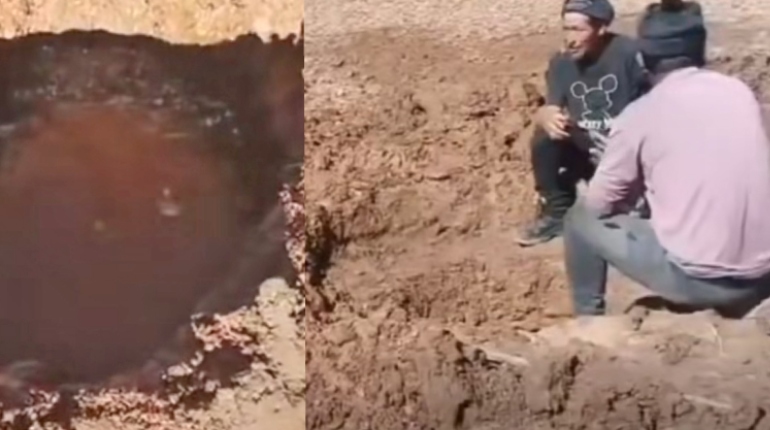 La falta de agua obliga a transportistas varados por bloqueos a cavar un pozo en la ruta La Paz-Oruro